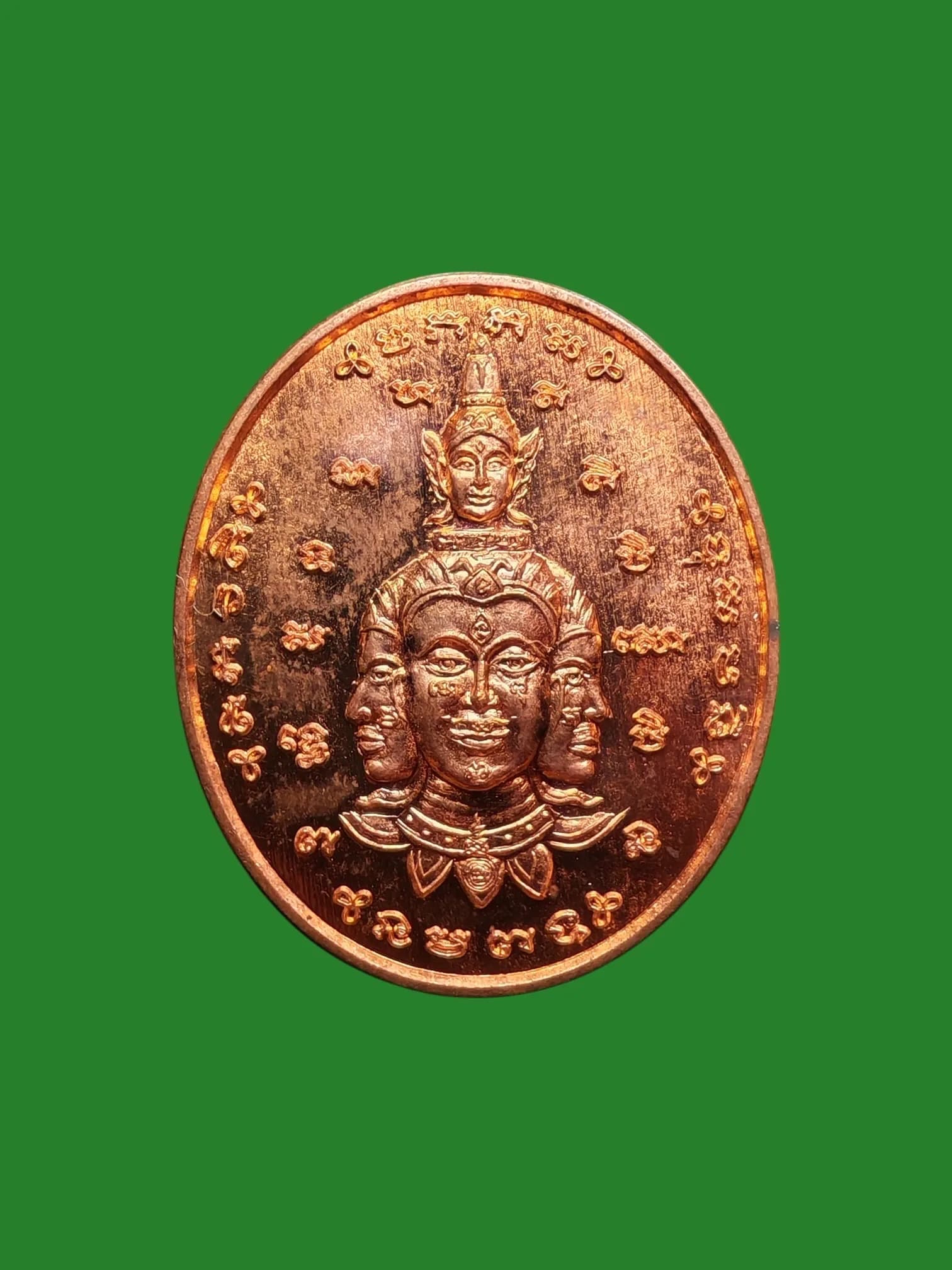 Itthipiso amulet with gold face by Ajarn Tiw, Wat Manichalakhan, Lopburi, B.E. 2557, copper